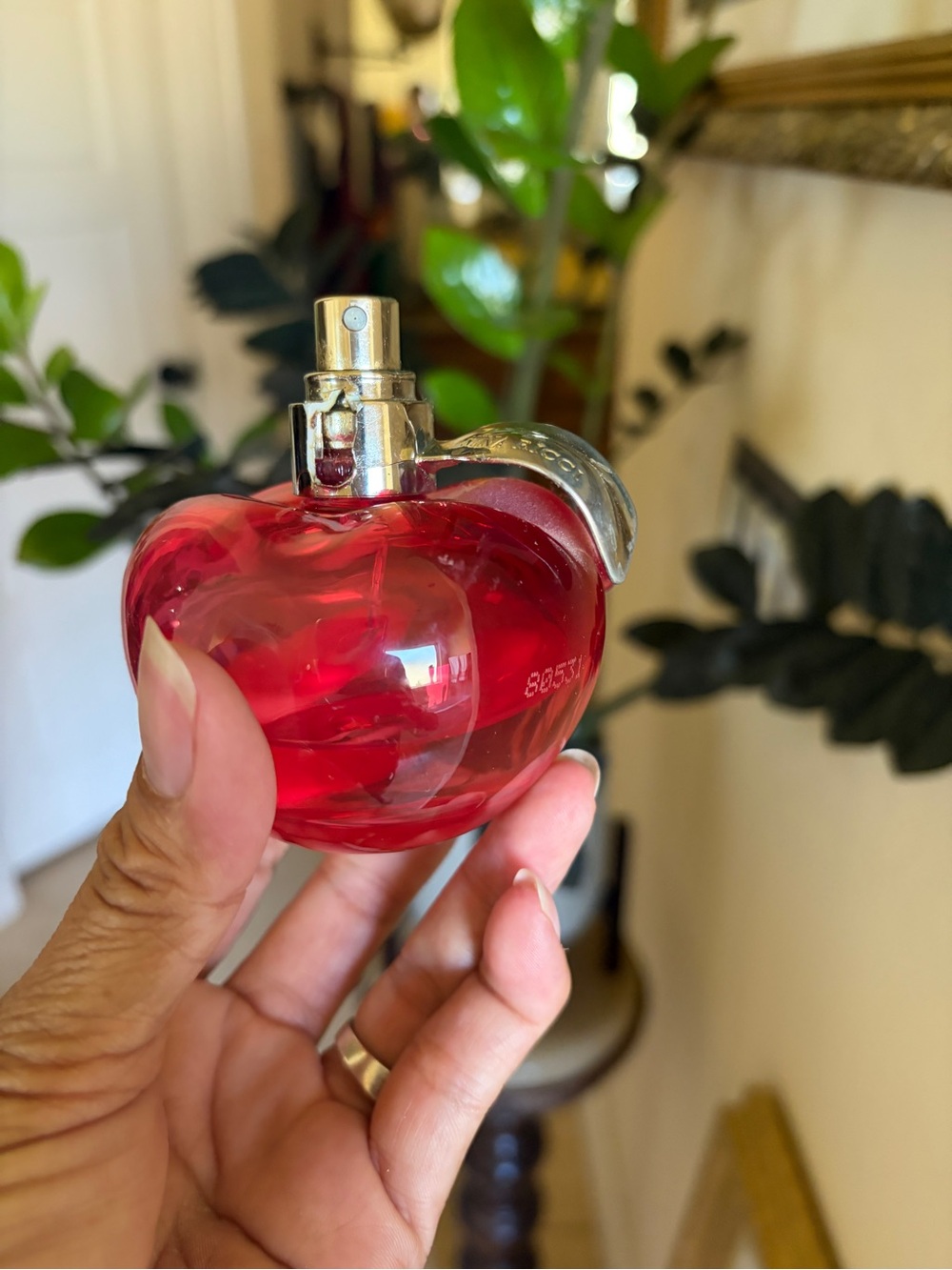 Nina Ricci Red Apple-Shaped Fragrance Bottle with Silver Leaf - Picture 5 of 7